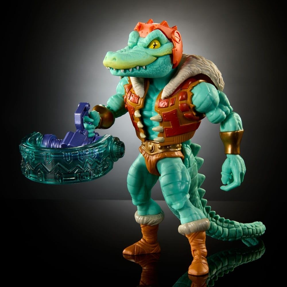 Masters of the Universe Leatherhead with weapons highlights crossover accessories.