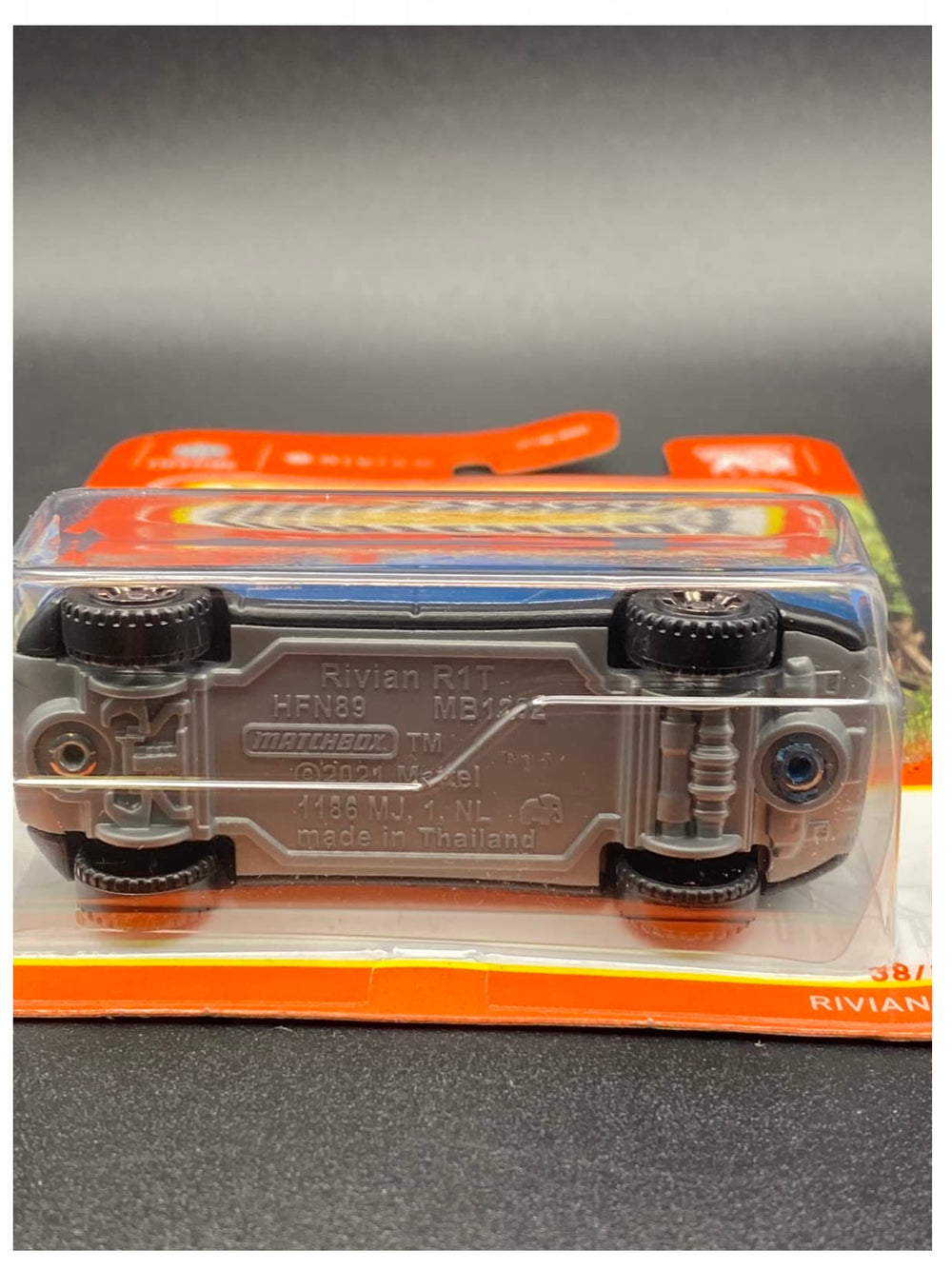 Matchbox Rivian R1T blue close-up grille detail for fans.