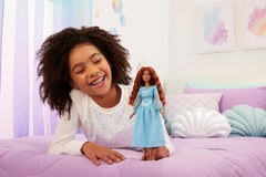 Mattel Ariel face-closeup highlighting her long red hair for styling fun.
