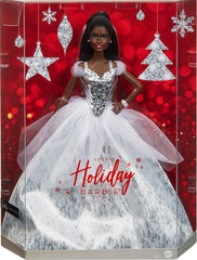 Barbie Signature 2021 Holiday doll includes stand and Certificate of Authenticity for collectors.