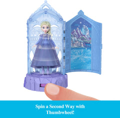 Mattel Disney Frozen Anna and Elsa dolls in iconic outfits.