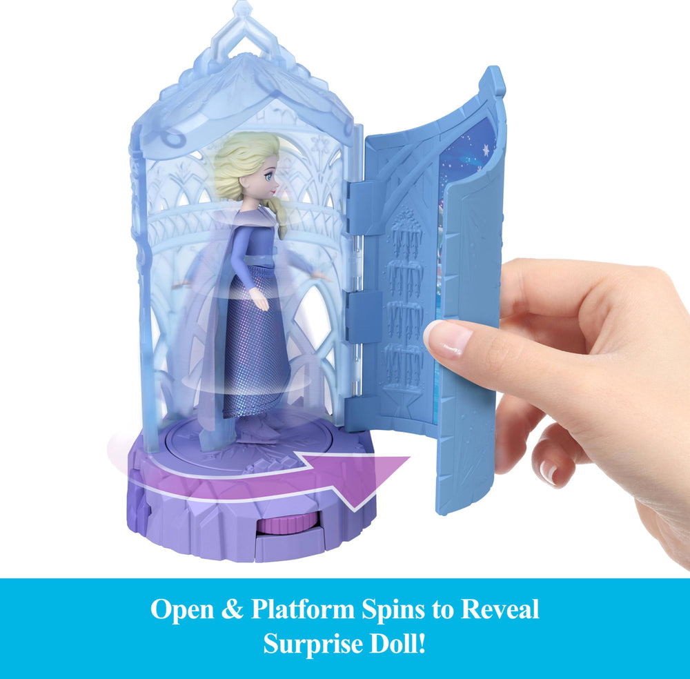 Mattel Disney Frozen Spin Surprise interior spins via thumb wheel for repeated reveals.
