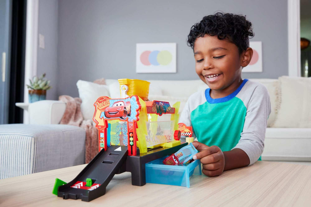Mattel Disney Pixar Cars race ramp view with green flag for action-packed play.