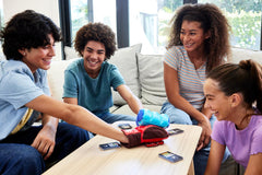 Mattel Games Rock Em Sock Em blue glove in action fuels teamwork.