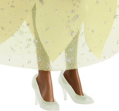 Mattel Tiana accessories—sparkling earrings and shoes enhance the crown-inspired look.