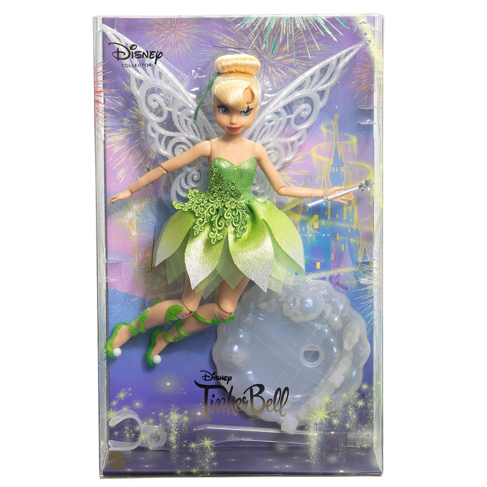 Mattel Tinker Bell doll with white ribbon hair and shimmering wand for magical posing.