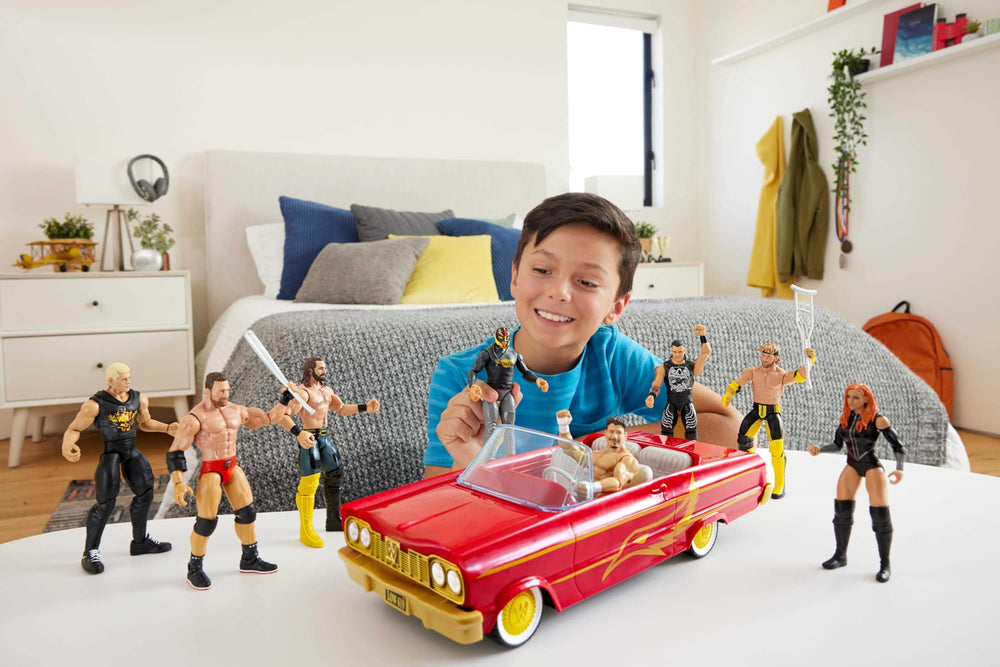 Mattel WWE Rey Mysterio Main Event figure with articulation ready for dynamic poses.