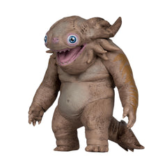 McFarlane Toys Baby Kaiju figure; scale reference fits with 4–5 inch DC collectibles.