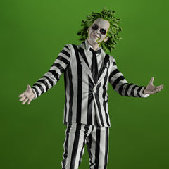 Printed backdrop highlights Beetlejuice figure scene and photography