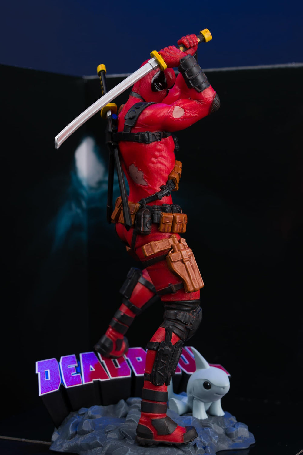 McFarlane Toys Deadpool figure beside comic backdrop creates immersive setup.