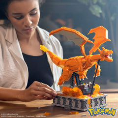 Mega Brands Motion Charizard wings-flap in a dynamic display scene.