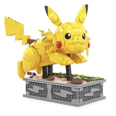 Mega Brands Pokémon Motion Pikachu legs, feet, and swinging tail activated by crank for animated display.