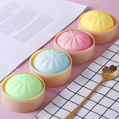 Meiest dumpling stress ball blue, tactile relief for tense moments.