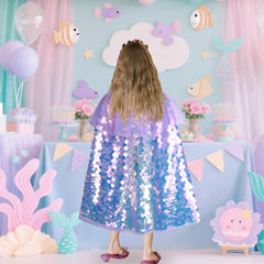 Close-up of hand-stitched mermaid scale cape by Meland