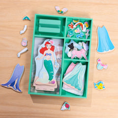 Doll stand with outfits arranged for easy access