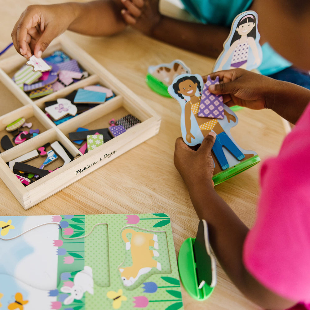 Melissa & Doug Best Friends dolls set with four figures boosts creative dressing play.