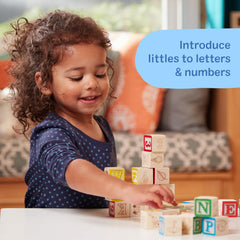 Melissa & Doug blocks stacked in play show alphabet and number recognition.