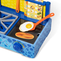 Knobs that click and turn on Blue's Clues & You wooden stovetop
