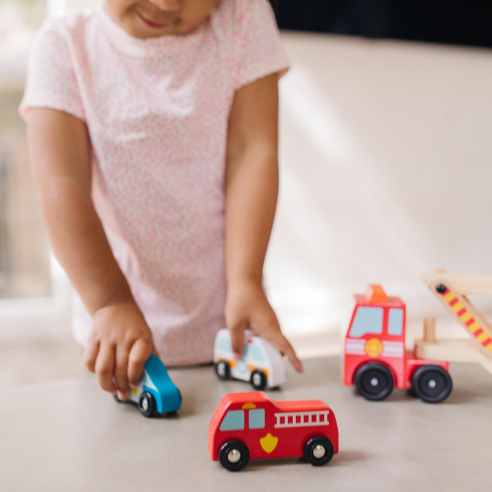 Melissa & Doug wooden construction and bright colors attract little hands.