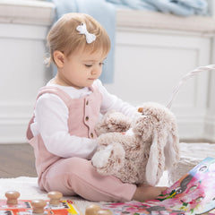 Burrow Bunny's big feet invite cuddles and imaginative play.