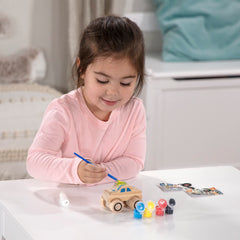 Melissa & Doug paintbrush aids quick, even color application on the Monster Truck.