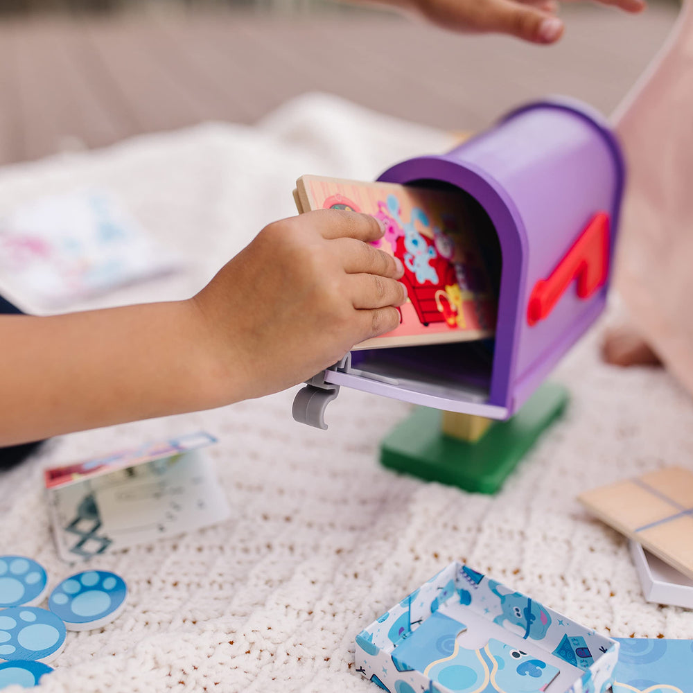 Melissa & Doug gift box and shipping pouch store pieces for travel play.