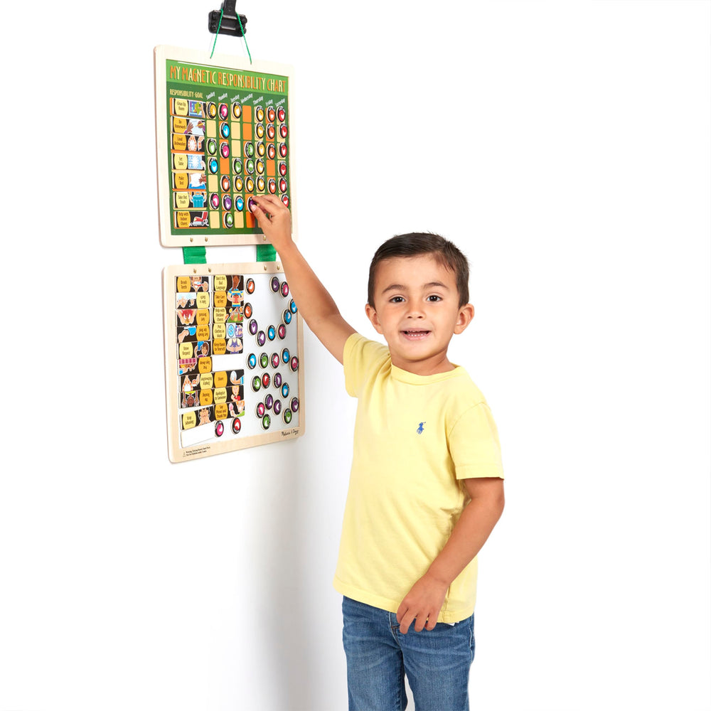 Melissa & Doug magnet storage board keeps pieces accessible.