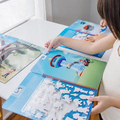 Spiral-bound Jake's Mountain activity book supports travel-friendly play by Melissa & Doug.