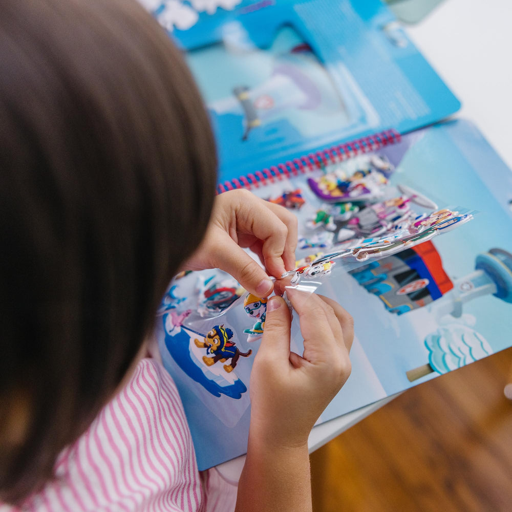 Built-in storage keeps all pieces organized during adventures with Melissa & Doug.