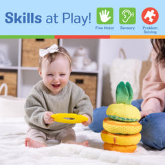 Melissa & Doug Pineapple Soft Stacker baby hands stacking rings.