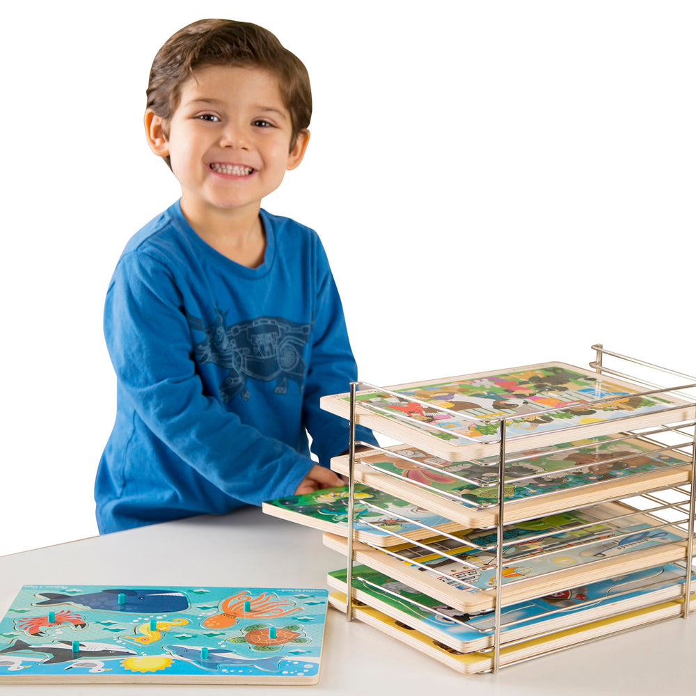 Melissa & Doug puzzle storage rack slots close-up highlighting sturdy metal construction