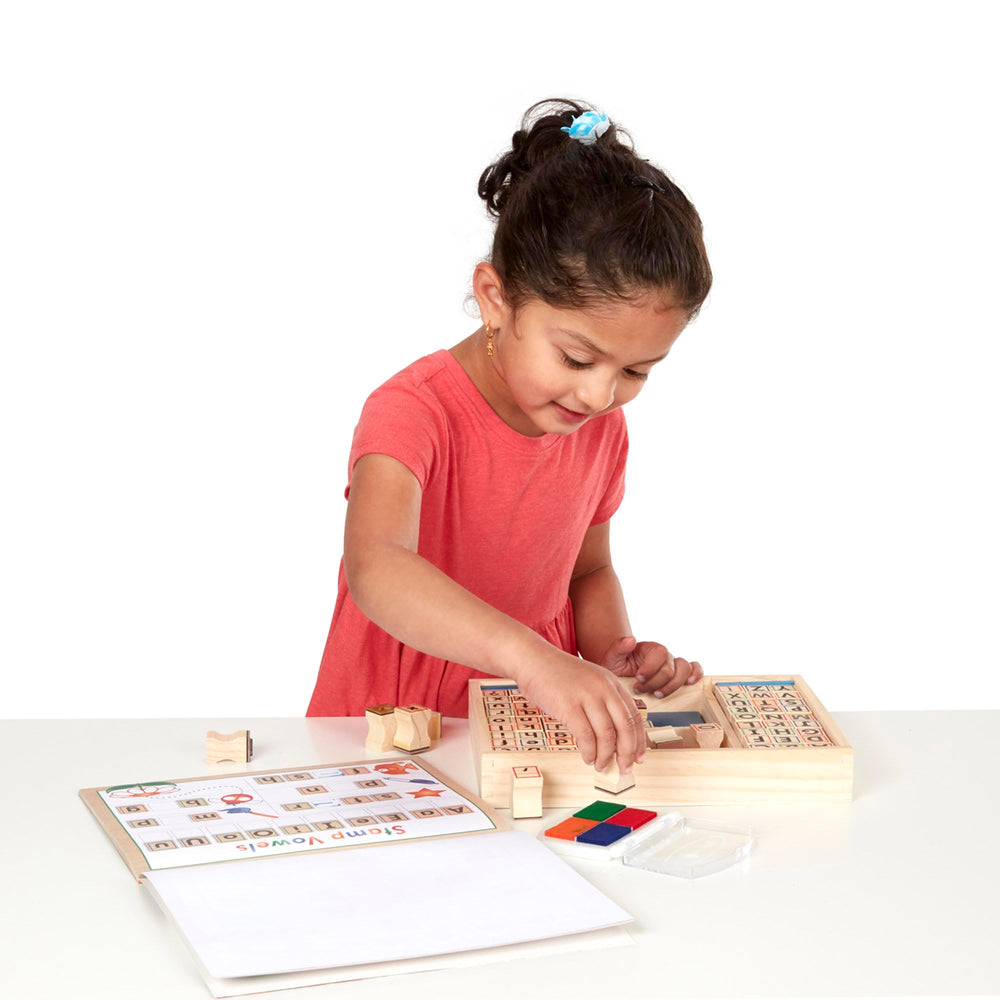 Melissa and Doug sturdy wooden tray keeps supplies organized