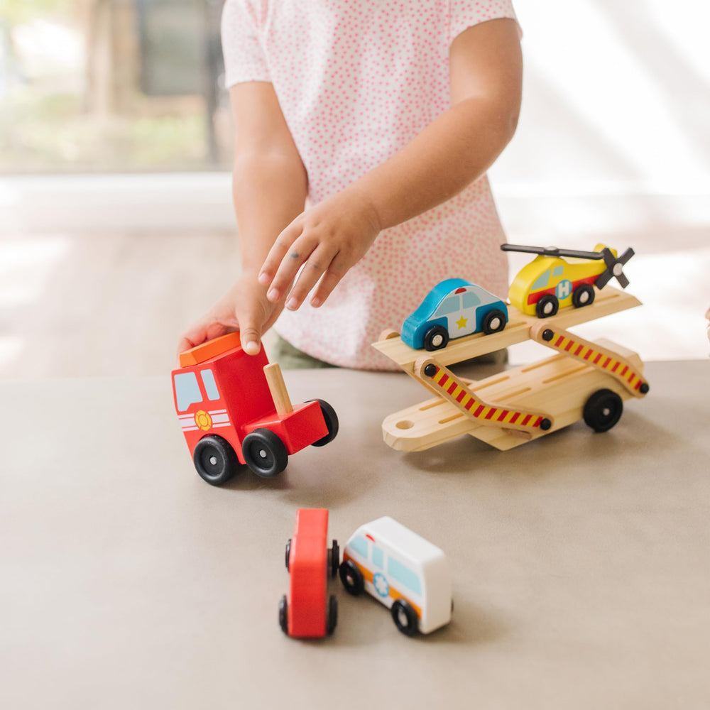 Melissa & Doug two-level tractor trailer delivers extended storage and action.