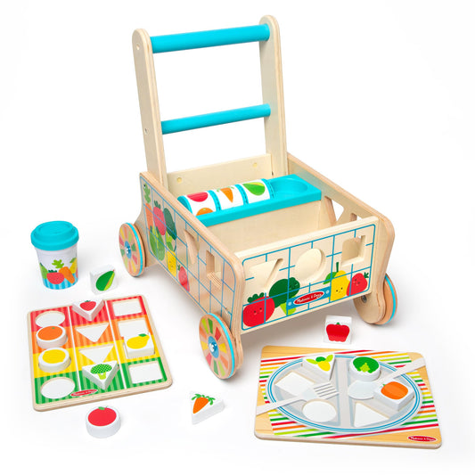 Melissa & Doug wooden grocery cart push toy with shape sorting pieces for early learning.
