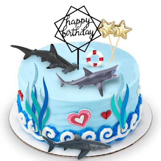 MEMOVAN shark cake toppers set on a colorful ocean cake for kids.
