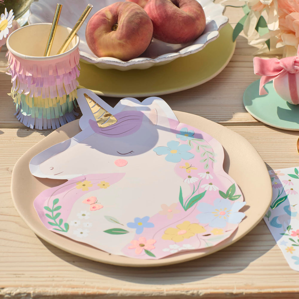 Meri Meri Meadow Unicorns plates on a table demonstrating 450gsm durability for hot or cold foods.