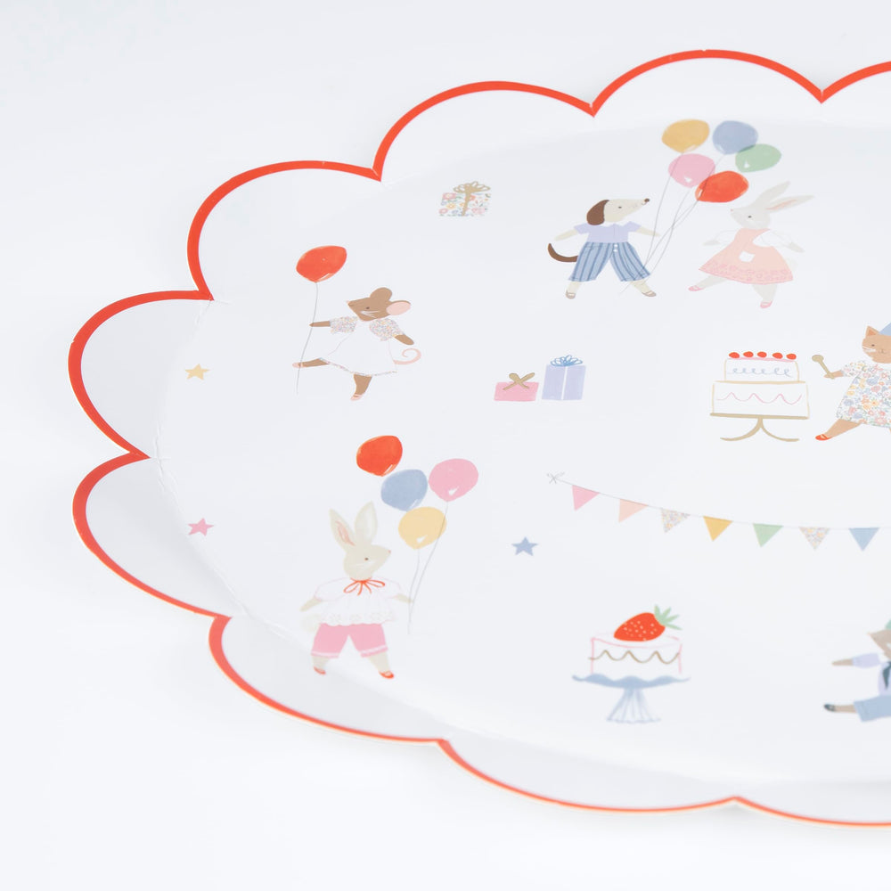 Meri Meri Animal Friends plates feature pastel animal illustrations for festive celebration tables.