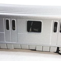 METRO diecast subway train side view highlights sleek profile for display.