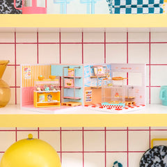 MGA's Miniverse Pizza Shop pack unbox for playful storefront dioramas.