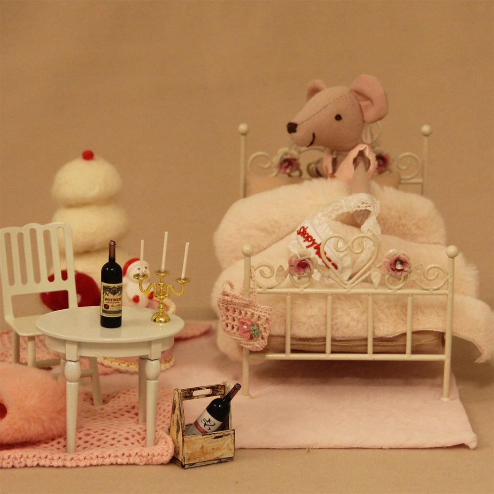 Dollhouse furniture that captures vintage-inspired charm and detailed artistry.