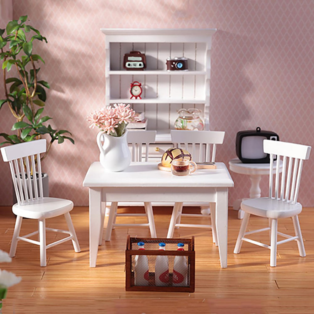 Minamzee miniature vase and wooden tray enhance table decor and storytelling.