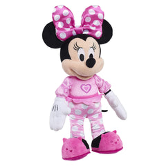MINNIE Mouse light-up bow adds magical moments during songs.