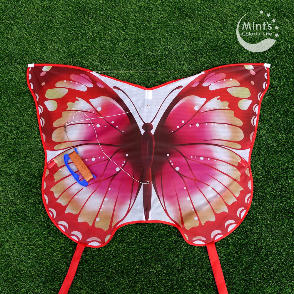 Mint's Colorful Life pink kite with 300ft line and upgraded handle.
