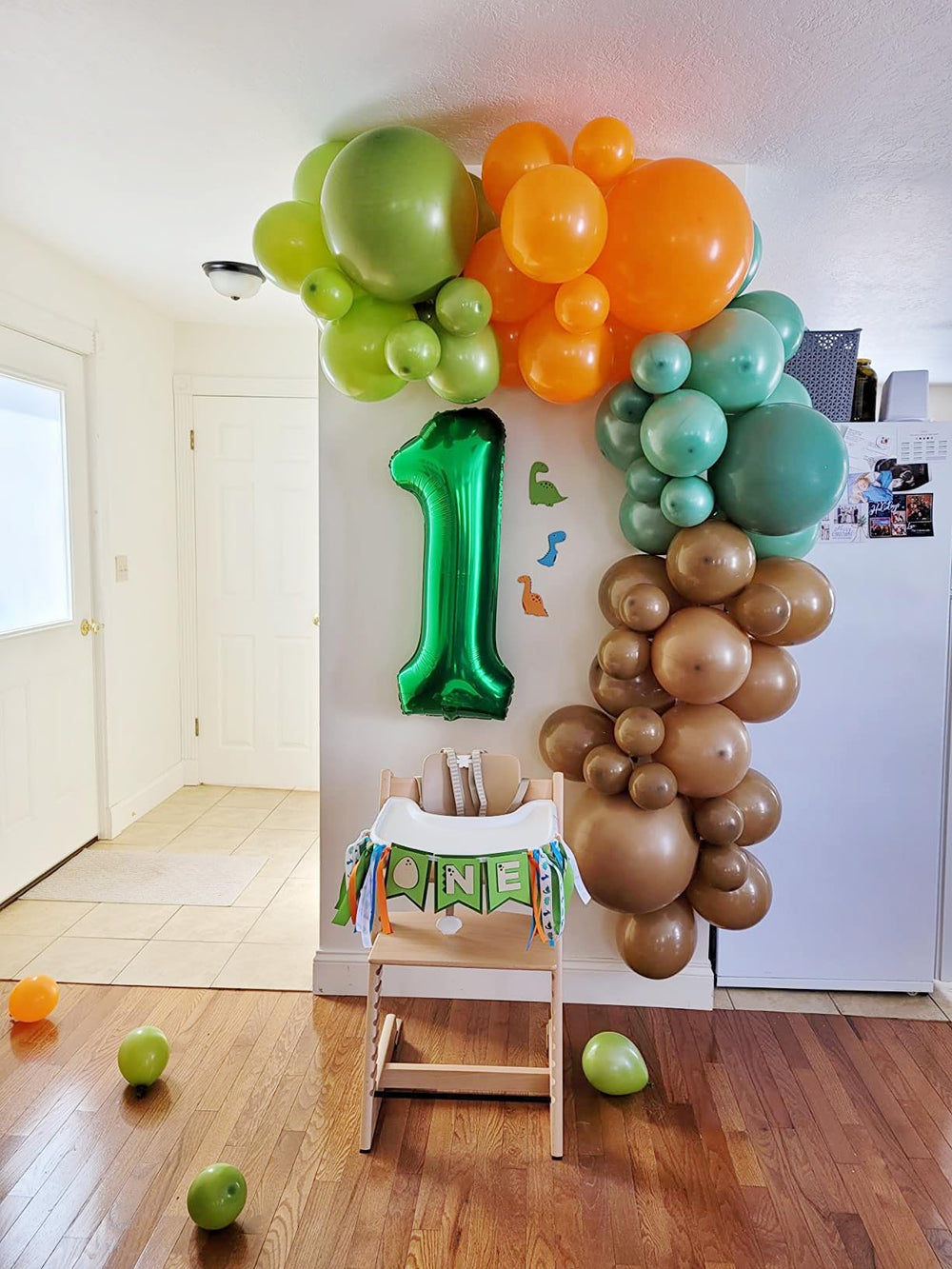 Mluchee graduation balloon provides a striking backdrop for photos