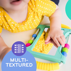 MÖBI Mobi Peeka has graspable handles for little hands to practice grip.
