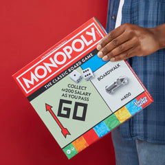 Monopoly wide game board design improves visibility for all players.