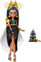 Monster High Cleo De Nile's snake-inspired bracelet and pyramid earrings complete the royal look.