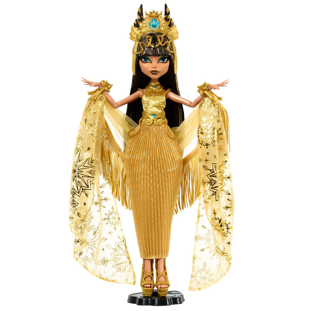 Monster High Cleo De Nile Howliday Winter Edition doll in a gold gown ready for display