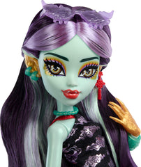 Monster High Jinafire Long doll with backpack for travel-ready adventures.