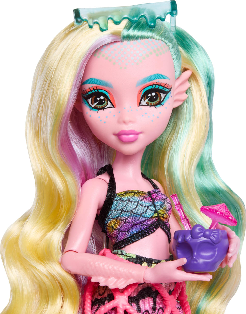 Lagoona Blue wearing a swim top and colorful coverup with fishnet details